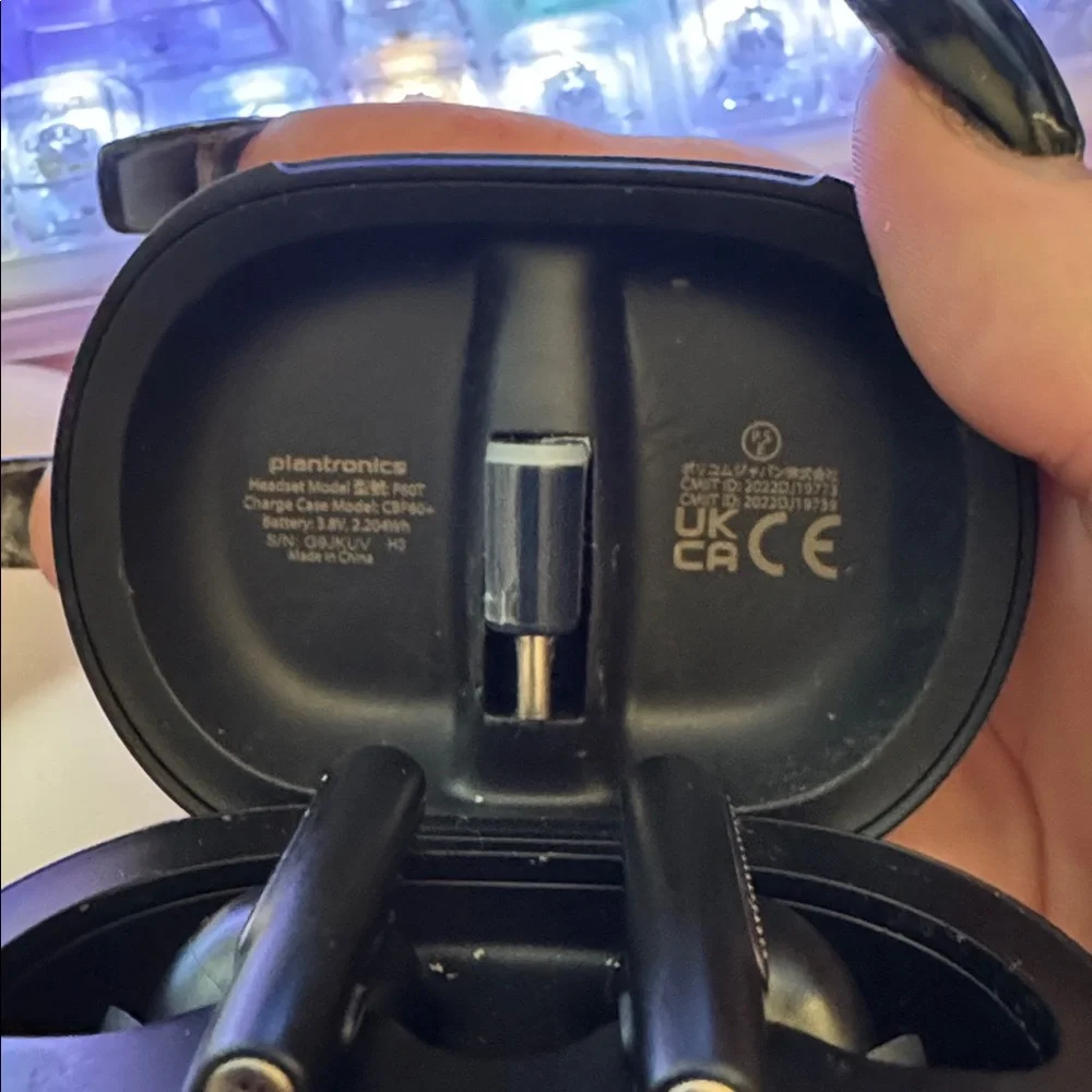 Poly wireless black headphones with charging case